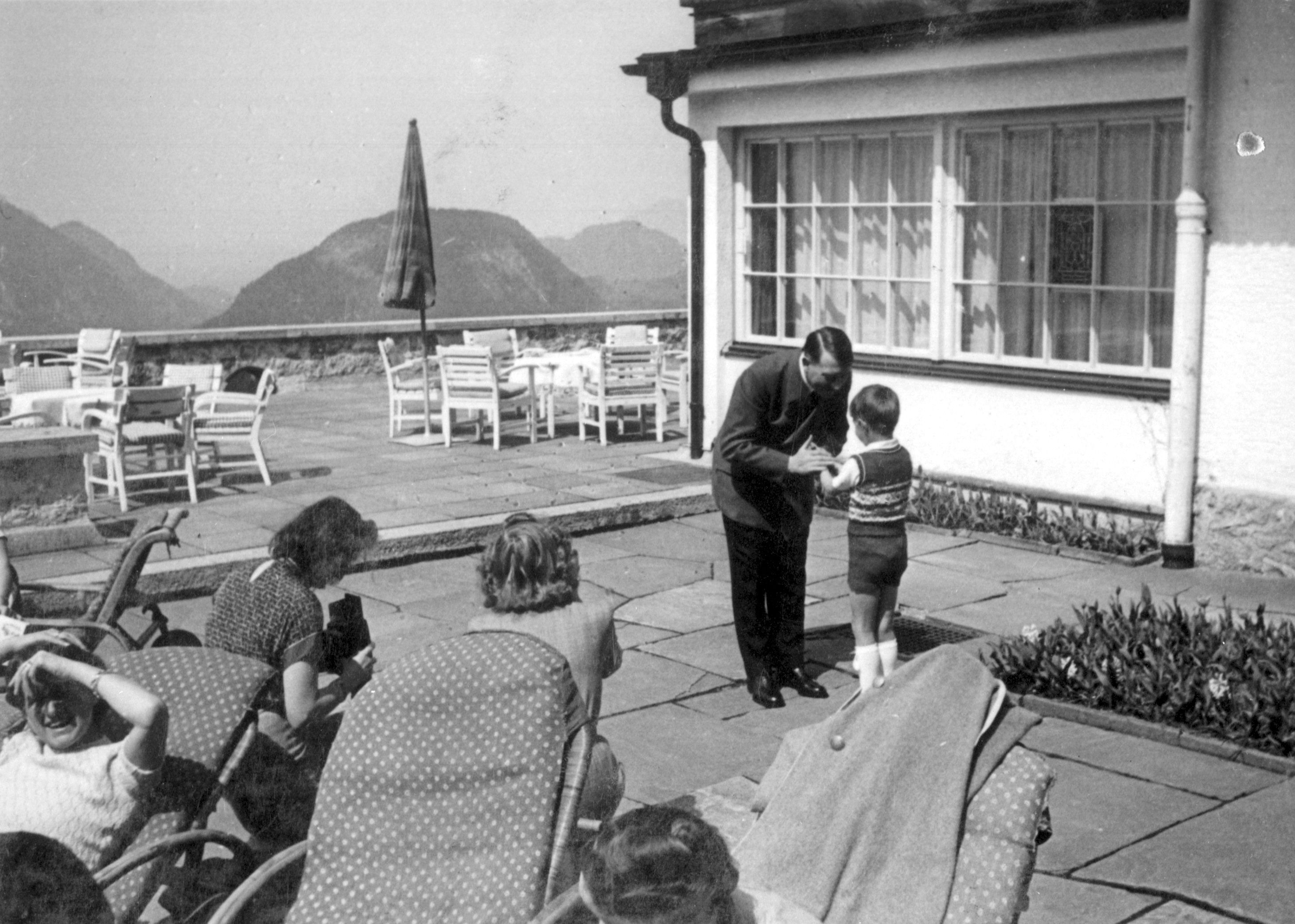 Adolf Hitler with Albert Speer Jr on the Berghof terrace in the summer of 1940, from Eva Braun's albums